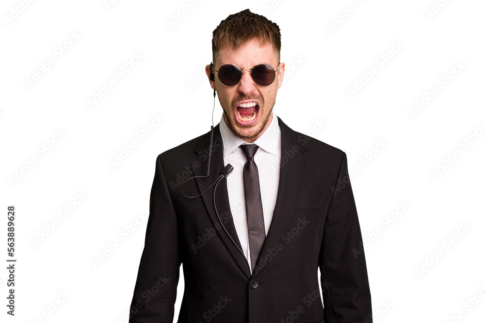 Security bodyguard man wearing a suit isolated cut out screaming very angry and aggressive. Security bodyguard man wearing a suit isolated cut out screaming very angry and aggressive.
