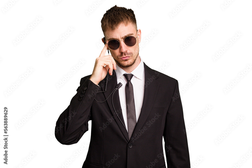Security bodyguard man wearing a suit isolated cut out pointing temple with finger, thinking, focused on a task. Security bodyguard man wearing a suit isolated cut out pointing temple with finger, thinking, focused on a task.