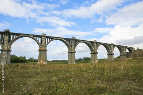 View of the abandoned old Mokrinsky railway bridge. Russia, the village of Mokry, the bridge was built in 1918