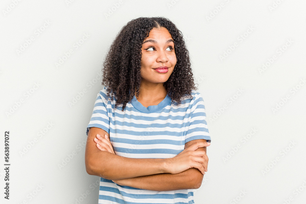 Young african american woman isolated on white background dreaming of achieving goals and purposes Young african american woman isolated on white background dreaming of achieving goals and purposes