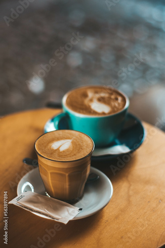 Photo of two coffees with beautiful bokeh in the background