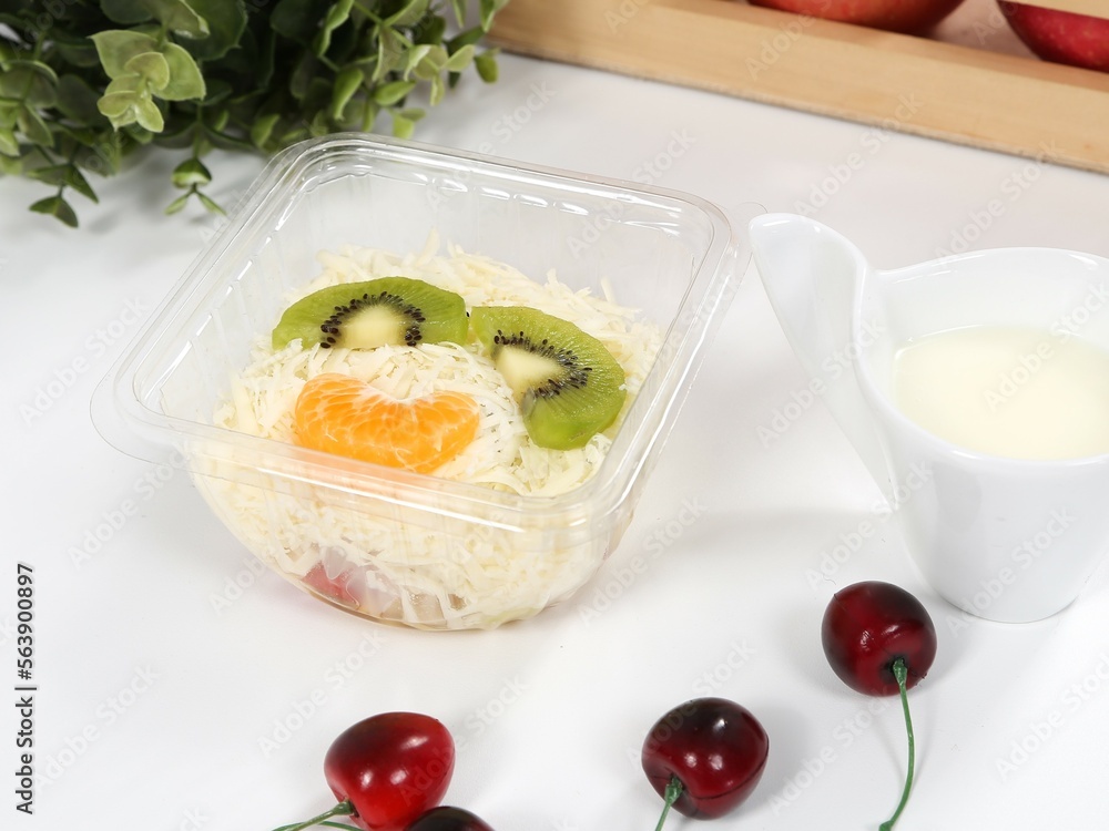 Delicious fruit salad with yogurt. This fruit salad contains a variety of fruits. Delicious fruit salad with yogurt. This fruit salad contains a variety of fruits.