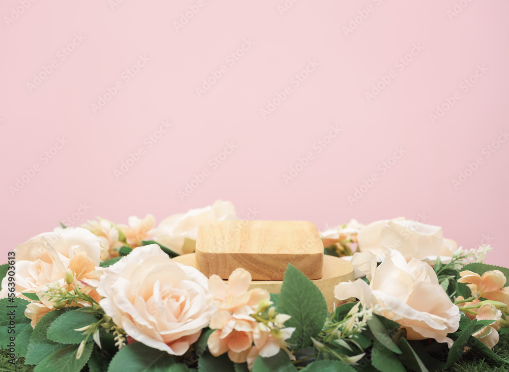 Fototapeta premium wood podium beige rose flowers on pink pastel background with space.beauty cosmetic skin care advertising stage,luxury romantic love valentines or mother gift, product pedestal platform stand display.
