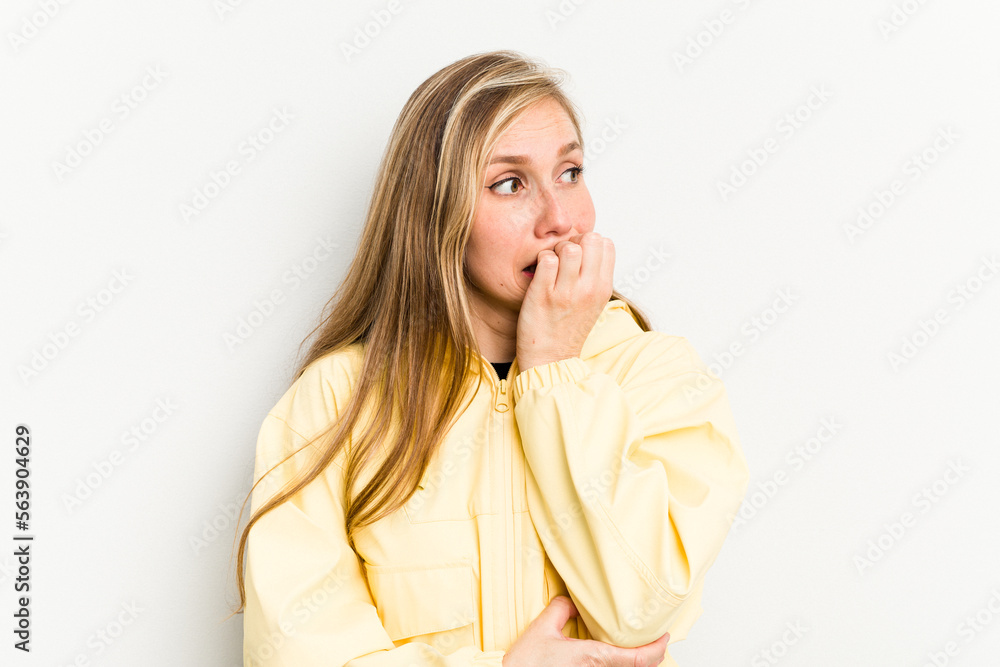 Young caucasian woman isolated on white background biting fingernails, nervous and very anxious. Young caucasian woman isolated on white background biting fingernails, nervous and very anxious.