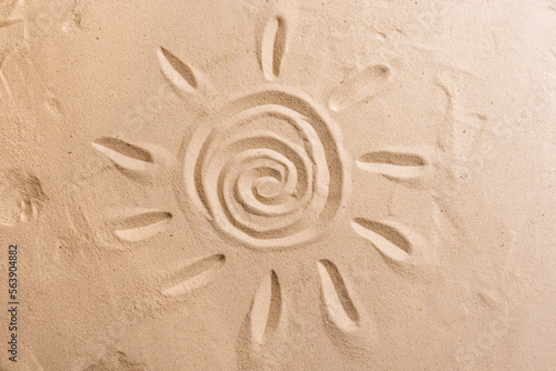 Sun symbol on sand