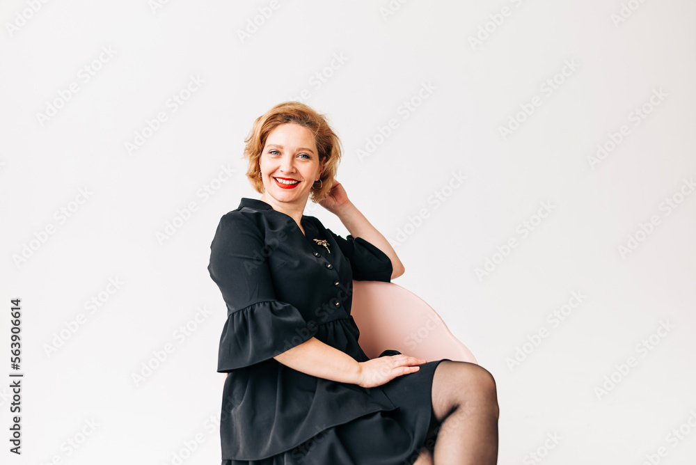Beautiful woman portrait in light studio. Adult beauty age Beautiful woman portrait in light studio. Adult beauty age