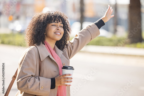 Taxi, coffee and commute with a business black woman calling or hailing a cab outdoor in the city. Street, travel and transport with a female employee commuting via ride share in an urban town