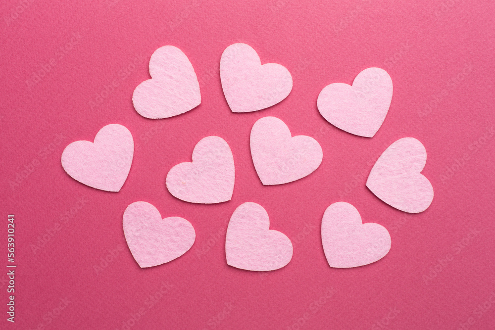 Fototapeta premium Felt hearts on color background, top view