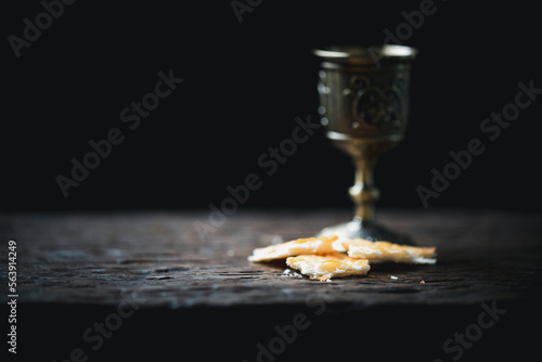 Concept of Eucharist or holy communion of Christianity. Eucharist is sacrament instituted by Jesus. during last supper with disciples. Bread and wine is body and blood of Jesus Christ of Christians.