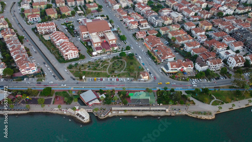 Wooden pier. This is often the most popular tourist attraction on the beach. Aerial view with drone. A marina place. 