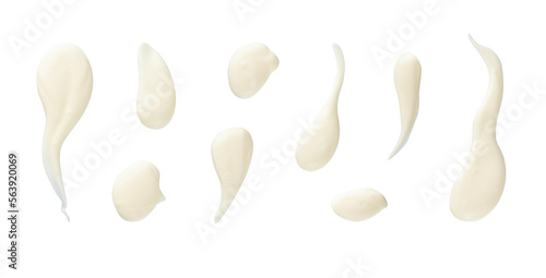 Set of white drops and splashes of mayonnaise or cream sauce isolated on white background. With clipping path. Full depth of field. Focus stacking. PNG 
