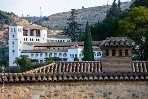 Architectural details of the Alhambra fortified palace complex and Granada city