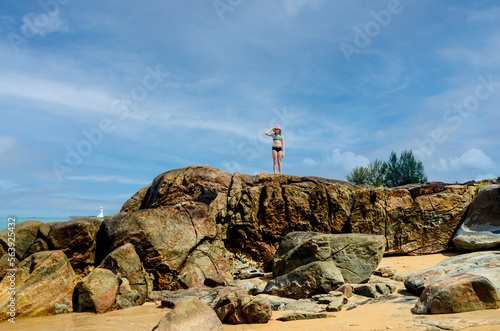 Beautiful young girl strolling on the beaches and lagoons of Khao Lak