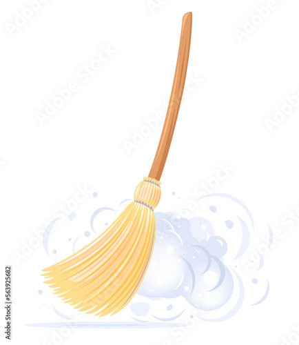 One big yellow broom sweep floor with long wooden handle and clouds of dust isolated, household implement from dust and dirt photo