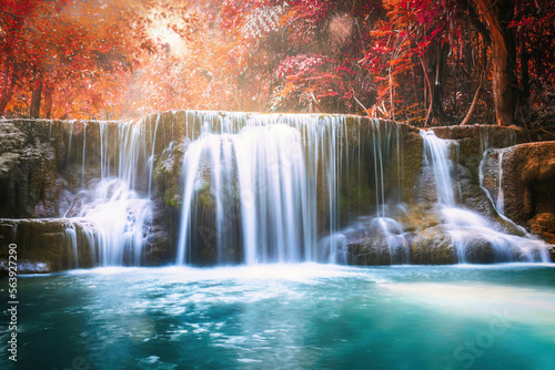 Fototapeta Naklejka Na Ścianę i Meble -  Waterfall flowing in autumn tropical rainforest at national park