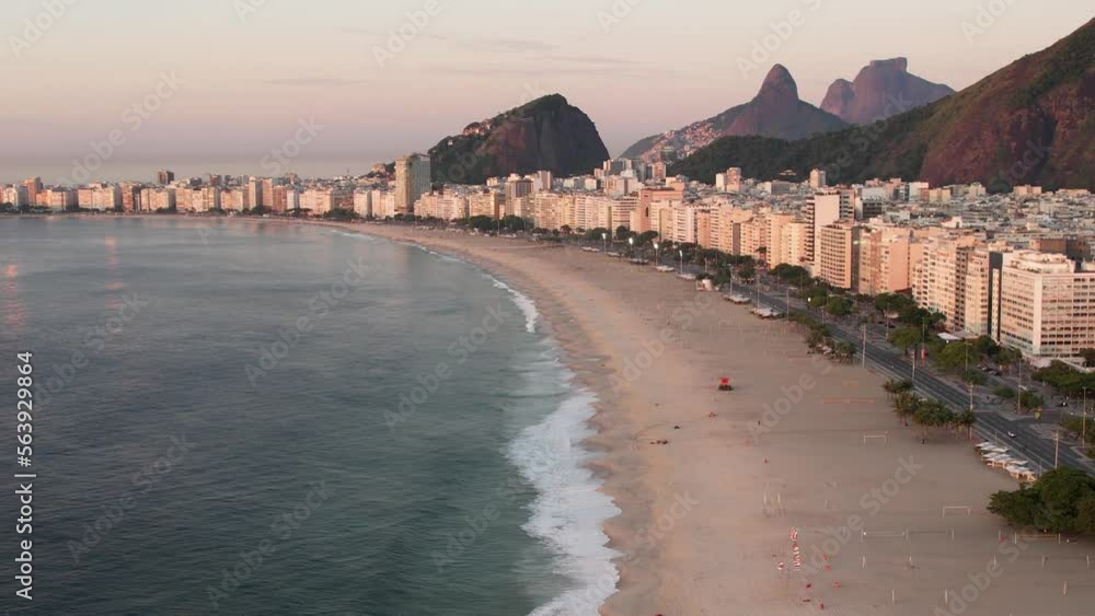 Aerial drone view over Copacabana Beach in Rio de Janeiro, Brazil with iconic Carioca mountainous landscape visible Aerial drone view over Copacabana Beach in Rio de Janeiro, Brazil with iconic Carioca mountainous landscape visible