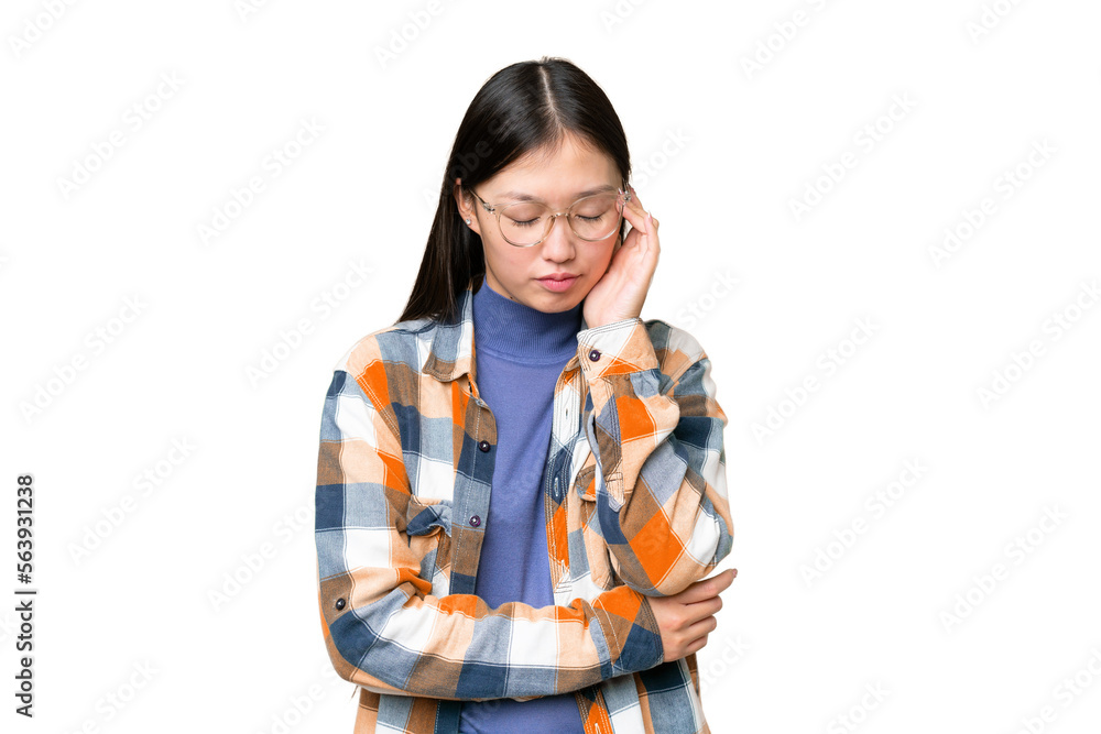 Young Asian woman over isolated chroma key background with headache Young Asian woman over isolated chroma key background with headache