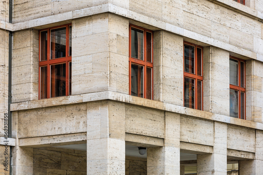Corner of the house of classical European architecture of the old cozy tourist city. Background with selective focus Corner of the house of classical European architecture of the old cozy tourist city. Background with selective focus