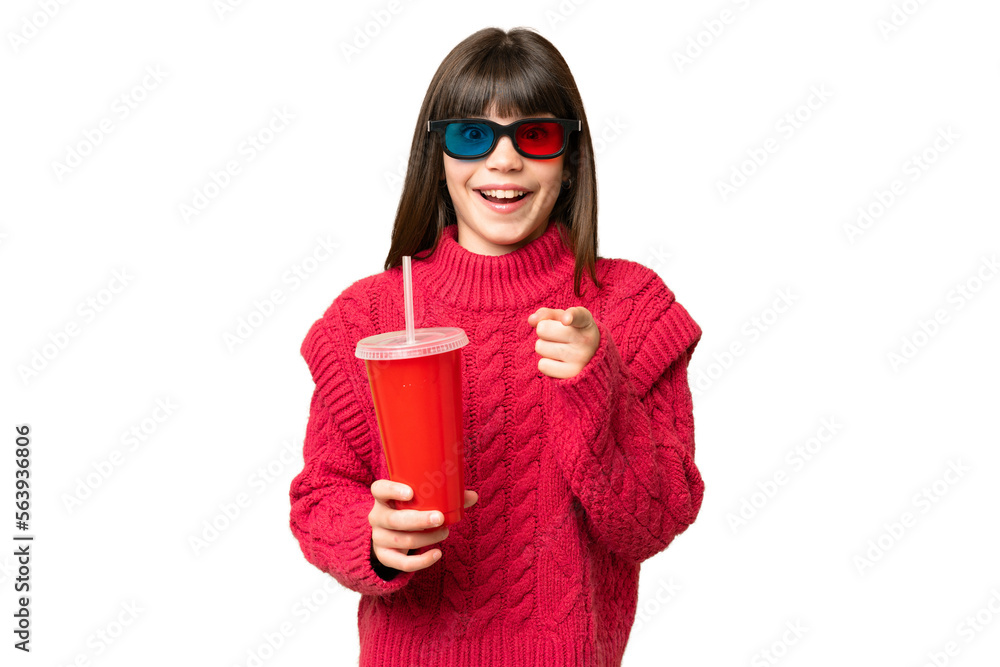 Naklejka premium Little girl holding soda over isolated chroma key background surprised and pointing front