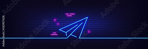 Neon light glow effect. Paper plane line icon. Airplane flight transport sign. Share symbol. 3d line neon glow icon. Brick wall banner. Paper plane outline. Vector