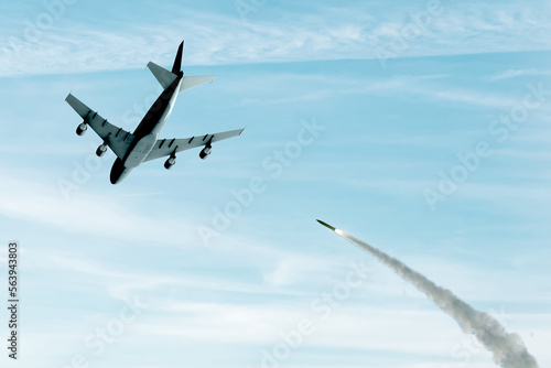 A military plane is flying a combat missile against the sky, smoke and fire from the rocket. Concept: missile attack, air alert, war between Russia and Ukraine.