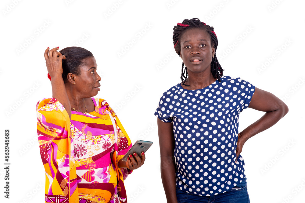Two young women use apps to shop online. Two young women use apps to shop online.