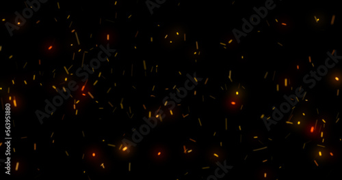 Abstract orange fiery sparks and smoke from a bonfire with fire, abstract background