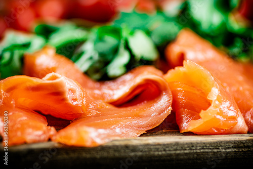 Pieces of salted salmon with parsley. 