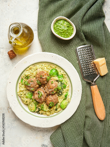 Orzo pasta with beef meatball, brussel sprout and cavolo nero pesto