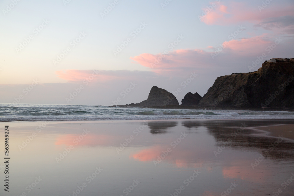 Pink Cloud and Reflection at Odeceixe Beach; Algarve; Portugal Pink Cloud and Reflection at Odeceixe Beach; Algarve; Portugal