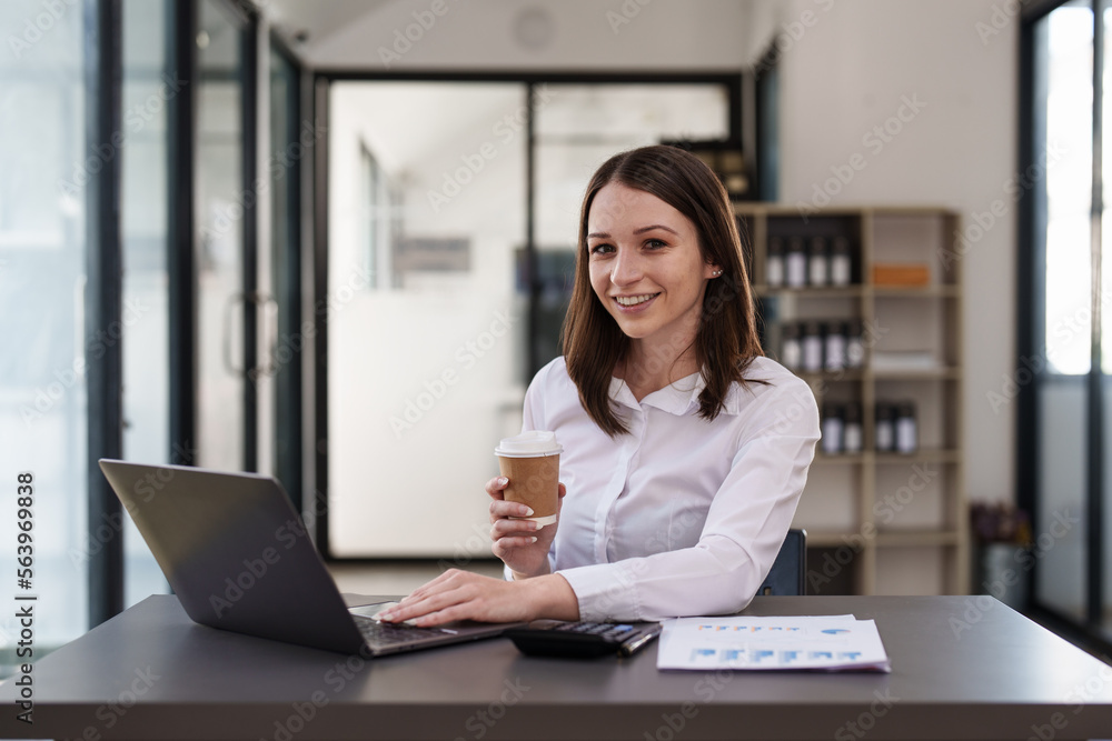 Business woman working at home office and analyze financial report document. Accounting and Finance concept Business woman working at home office and analyze financial report document. Accounting and Finance concept