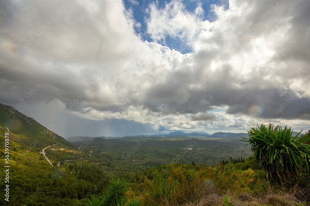 View from the mountain in Corfu, light and dark clouds, horizontal