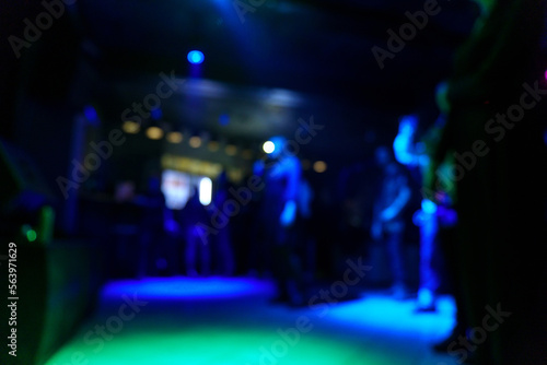 Unfocused entertainment concert stage lighting, blurry disco party. Rock concert. Selective focus