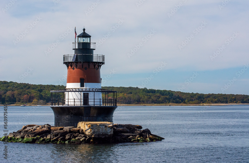 lighthouse on the shore of the sea lighthouse on the shore of the sea