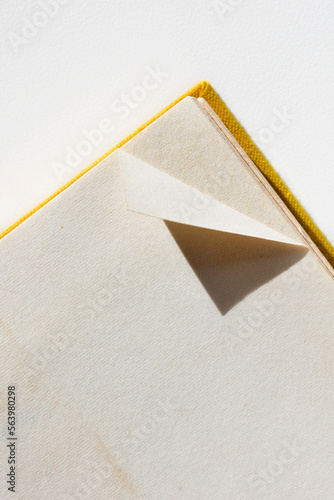 Opened book with dog-eared page
