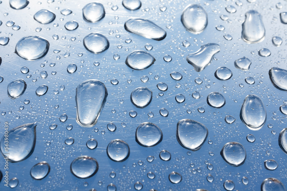 Water drops on steel background