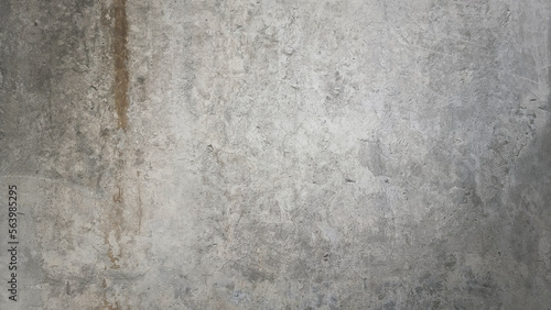 stained cement texture, rusty rough gray textured grunge concrete wall background with blank space for design. old weathered wall.