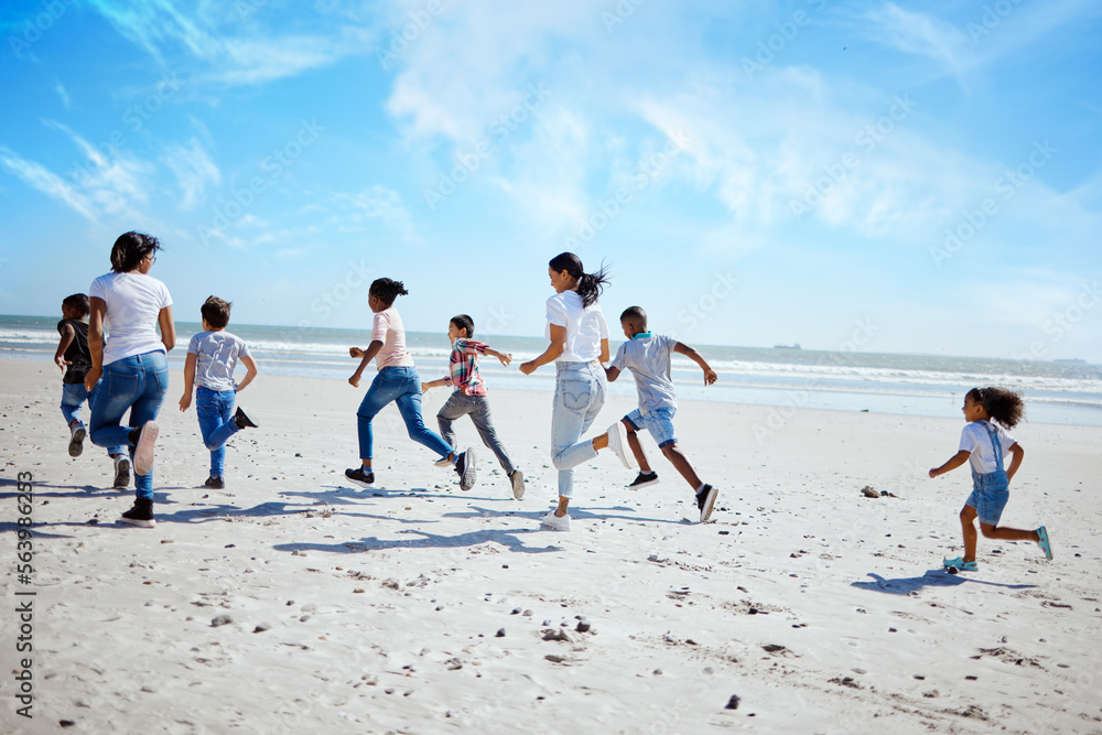 Running family, beach and adoption kids with happiness, bonding and sand with speed on summer vacation. Women, children and happy workout for group on holiday by ocean with diversity, love and care