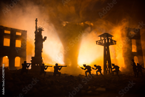 Conceptual image of war between Democracy and dictatorship using toy soldiers. Battle in ruined city.