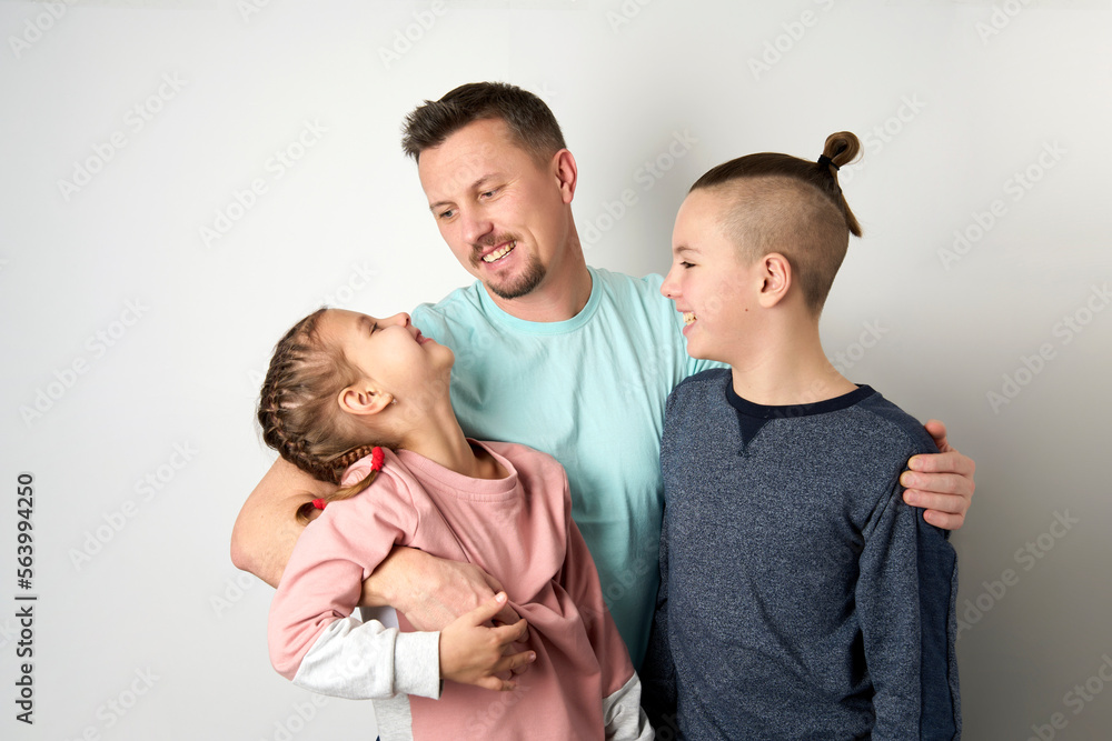 Happy family portrait on white background, close-up Happy family portrait on white background, close-up