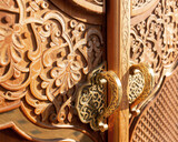 Wooden national patterns in Uzbekistan,  door and doorhandle