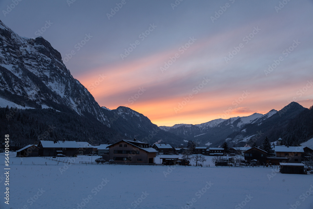 beautiful sunset in winter Bregenzerwald, Vorarlberg, Austria Schnepfau , view to the Kanisfluh