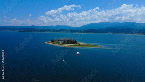 Fototapeta Naklejka Na Ścianę i Meble -  Another Parachute Ride over Lake Batak