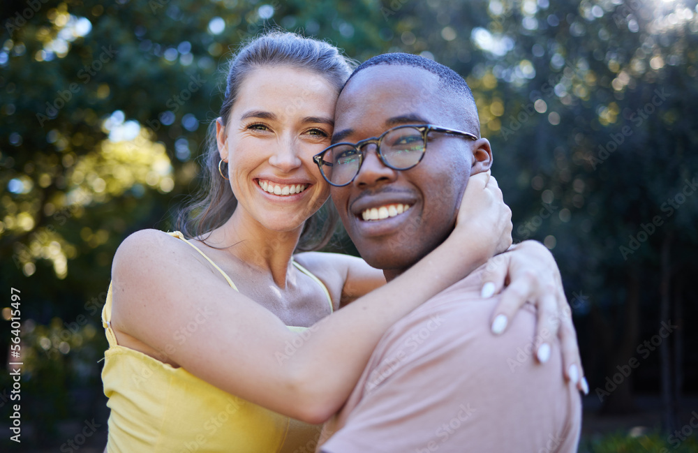 Portrait, couple on a date and hug with love in nature, outdoor in park with commitment in interracial relationship. Trust, support and happy people, black man and woman smile on face with fresh air Portrait, couple on a date and hug with love in nature, outdoor in park with commitment in interracial relationship. Trust, support and happy people, black man and woman smile on face with fresh air