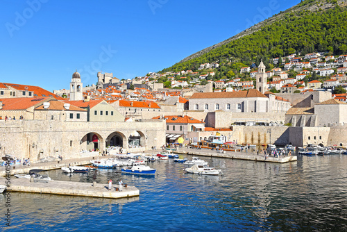 Dubrovnik harbor and city walls morning view with calm sea, Dalmatia region of Croatia