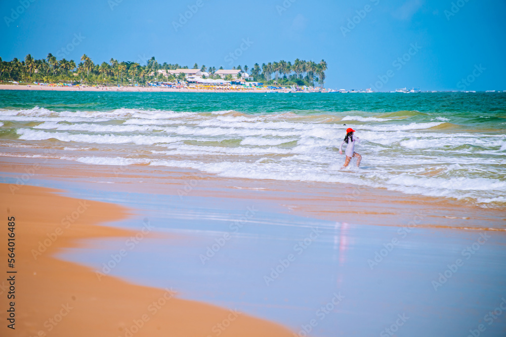 Guarajuba Beach, considered one of the best beaches of coconut-trees and natural pools in Brazil. It is a touristic region par-excellence, distinguished by its natural beauty. Bahia, 2020