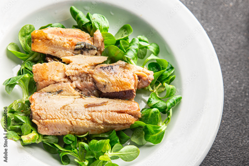 salad sardine green leaves, avocado, vegetable dish meal food snack on the table copy space food background rustic top view salad sardine green leaves, avocado, vegetable dish meal food snack on the table copy space food background rustic top view