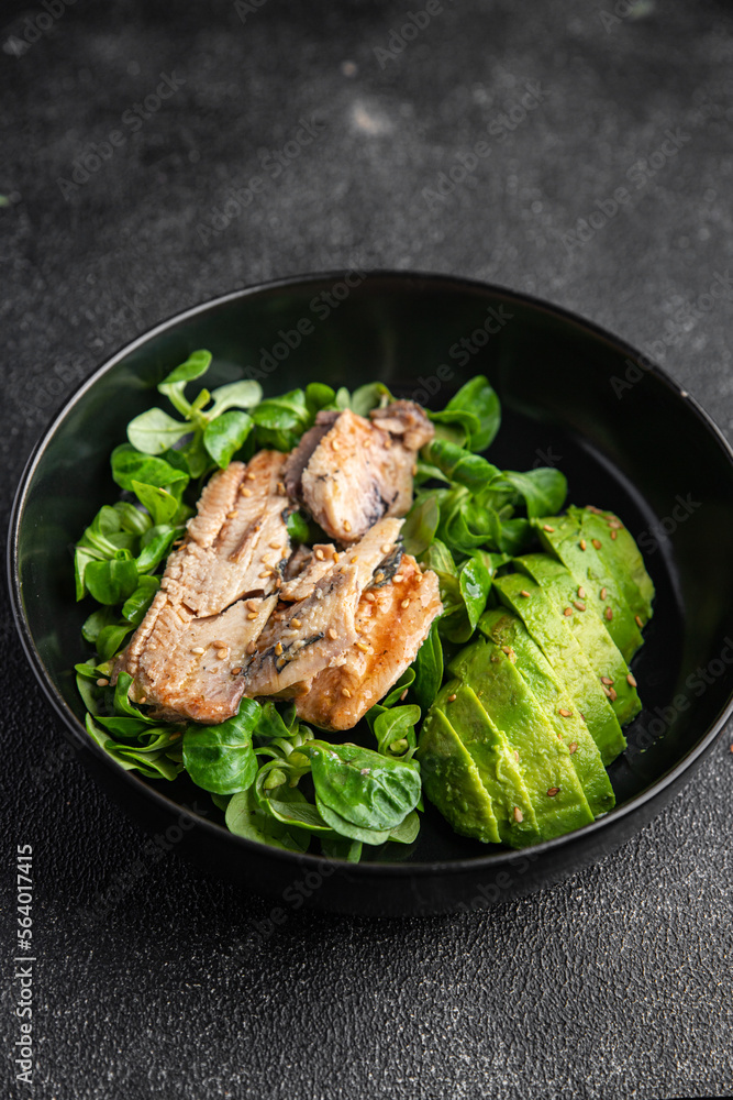 salad sardine green leaves, avocado, vegetable dish meal food snack on the table copy space food background rustic top view salad sardine green leaves, avocado, vegetable dish meal food snack on the table copy space food background rustic top view