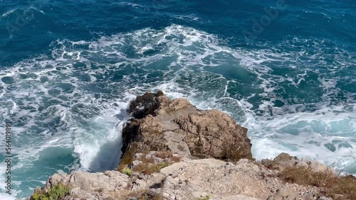 Cephalonia Greek island rocky shore slow motion Ionic sea waves landscape 4K footage. Beauty in nature and traveling concept.