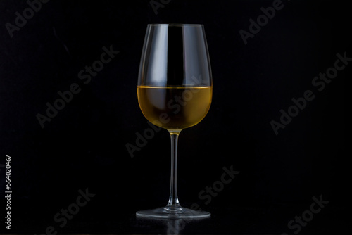 White Wine Glass on Black Background